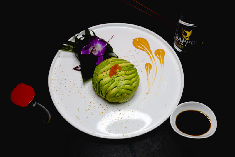 Avocado sushi ball with Sapporo beer